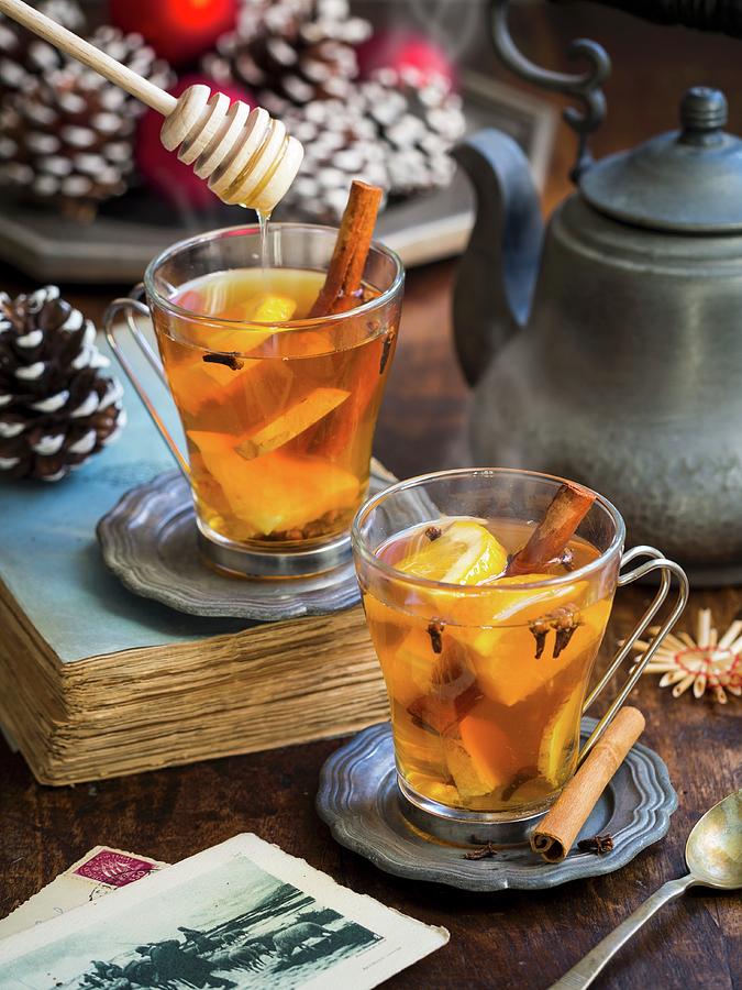 Hot Winter Spiced Tea On A Christmas Background Photograph by Magdalena Paluchowska