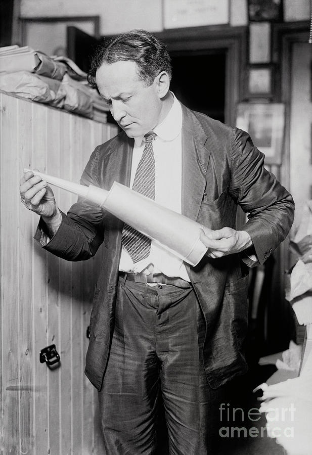 Houdini Holding Collapsible Trumpet Photograph by Bettmann