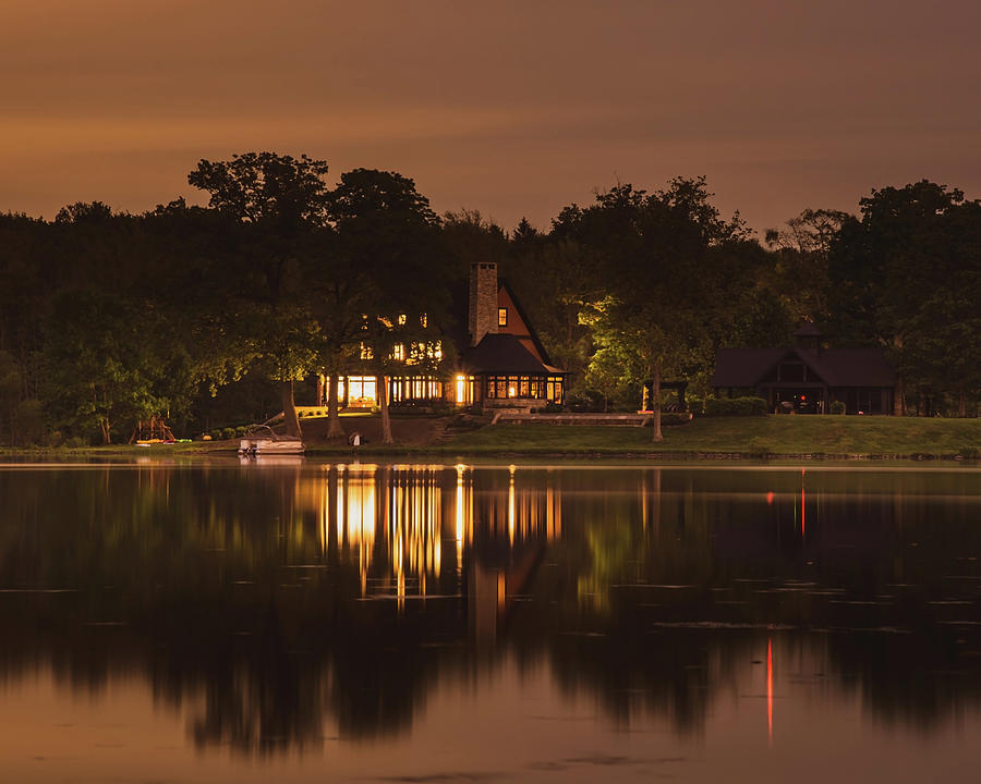 House On The Water At Night Photograph