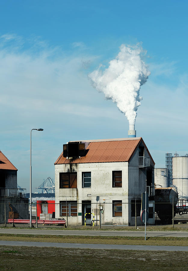 Architecture Digital Art - House Used For Training Firefighters, Smoke From Coal Fired Power Station In Background, Maasvlakte, Rotterdam, Zuid-holland, Netherlands by Mischa Keijser