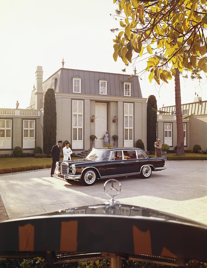 House Workers And Staff Looking At Car Photograph by Tom Kelley Archive House Workers And Staff Looking At Car Photograph by Tom Kelley Archive
