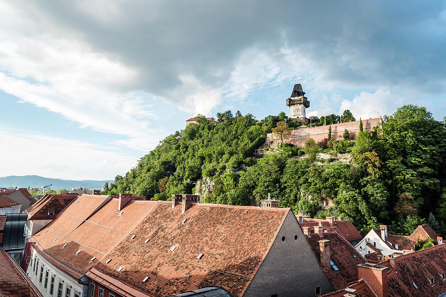Houses In Town Against Schlossberg And Cloudy Sky Photograph by Cavan Images Houses In Town Against Schlossberg And Cloudy Sky Photograph by Cavan Images