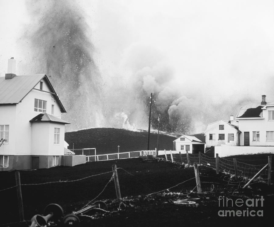 Houses Underneath Helgafell Eruption Photograph by Bettmann