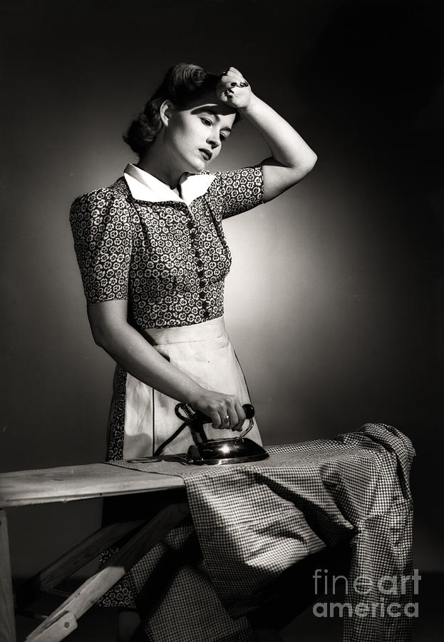 People Photograph - Housewife Ironing Shirt by Bettmann
