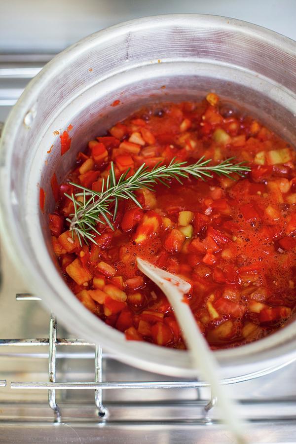 How To Cook The Tomato Sauce Photograph by Eising Studio
