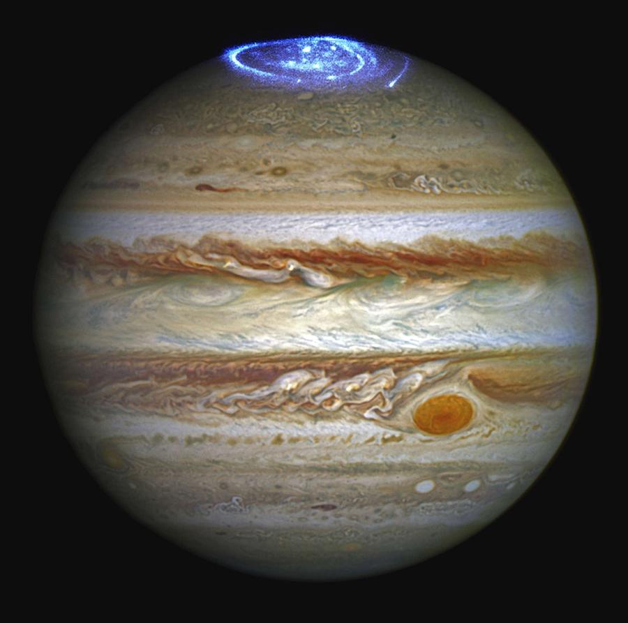 Hubble captures vivid auroras in Jupiters atmosphere. Original from NASA Painting by Celestial Images