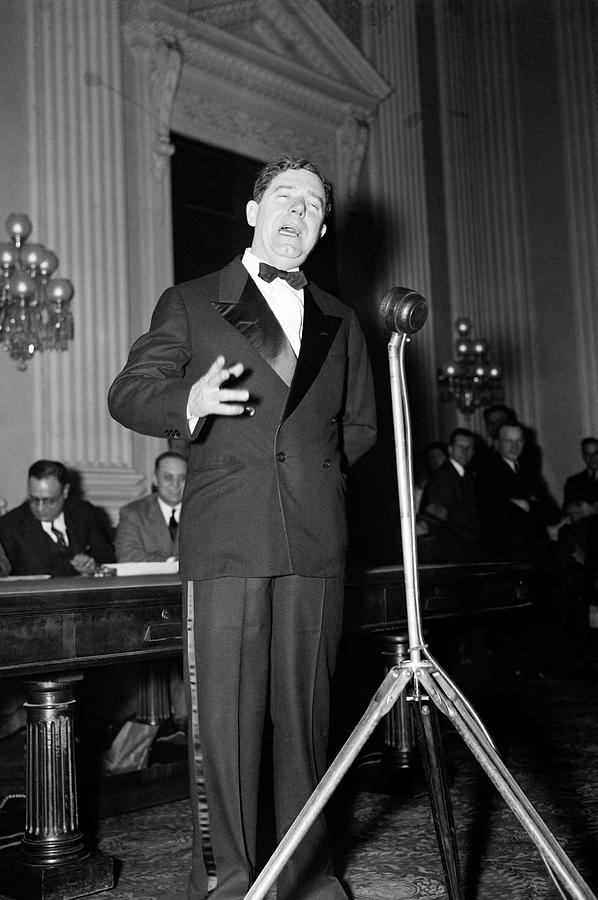 Huey Long Speaking Into Microphone - 1935 Photograph by War Is Hell Store
