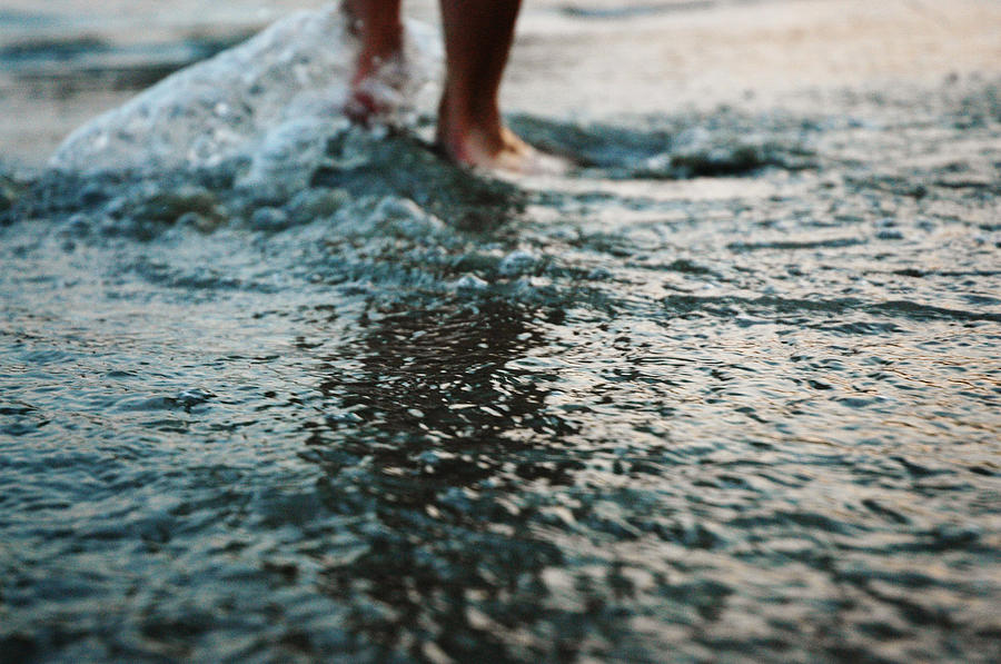 Human Feet Walking In Water Photograph by Grace Oda