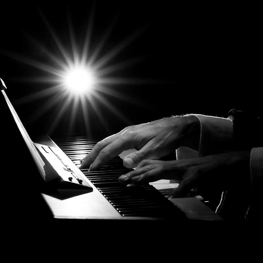 Human Hand Playing Piano Photograph by Simpatia