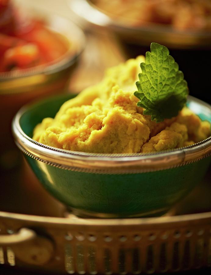 Hummus oriental Chickpea Cream On An Appetiser Buffet Photograph by Hannah Kompanik