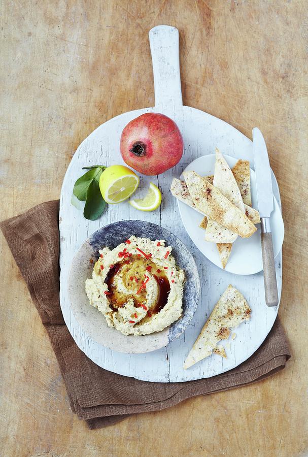 Hummus With A Pomegranate Balsamic Dressing Photograph by Charlotte Tolhurst
