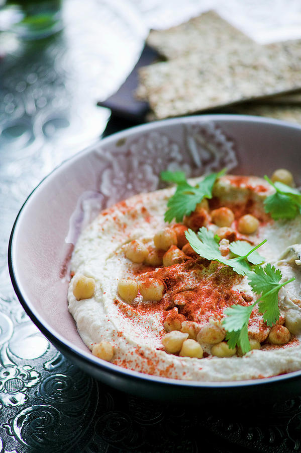 Hummus With Chickpeas And Paprika Powder Photograph by Karen Thomas