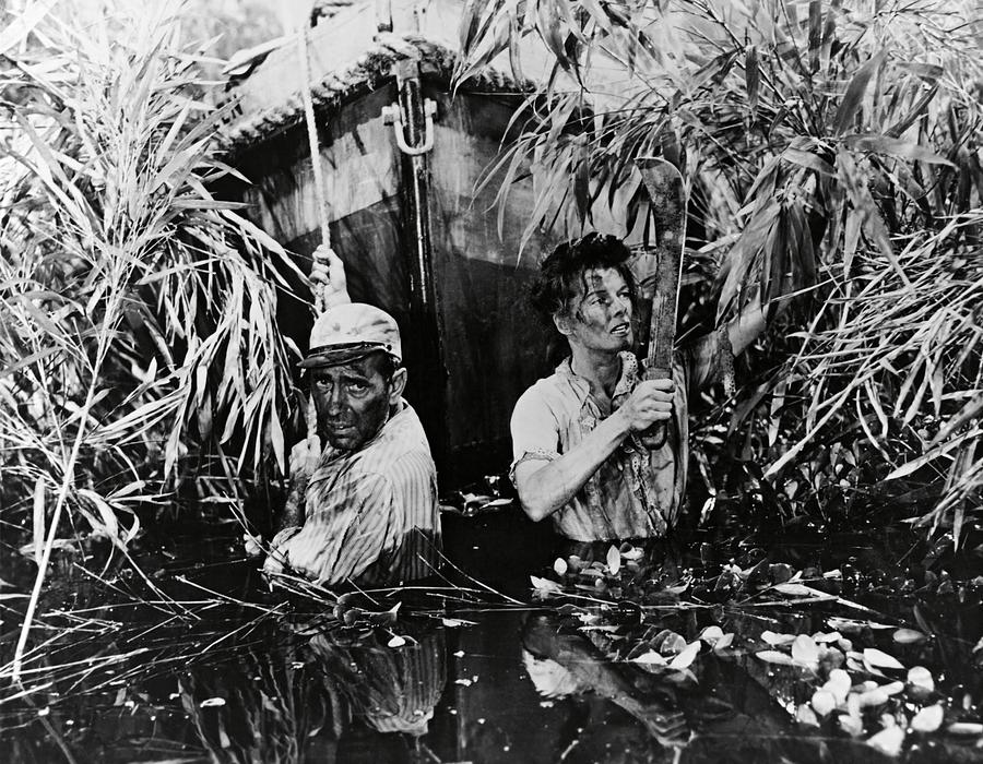 HUMPHREY BOGART and KATHARINE HEPBURN in THE AFRICAN QUEEN -1951-. Photograph by Album