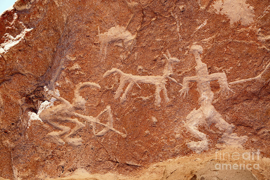 Hunter with Bow and Arrow Petroglyph Ofragia Chile Photograph by James Brunker