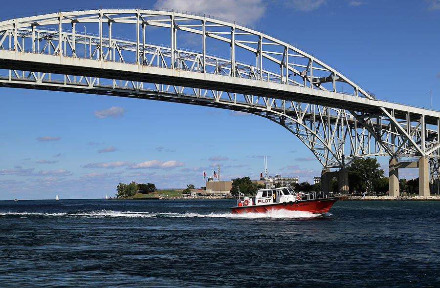 Huron Spirit and Blue Water Bridge Photograph by Mary Bedy