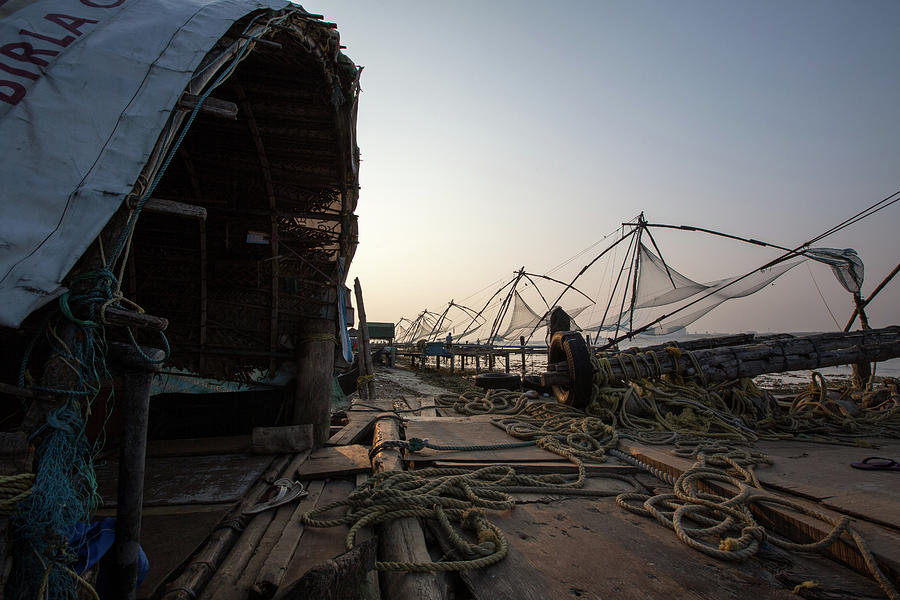 Pier And Fishing Nets On Beach At Sunset, Kochi, Kerala, India Poster by  Michael Truelove - Fine Art America