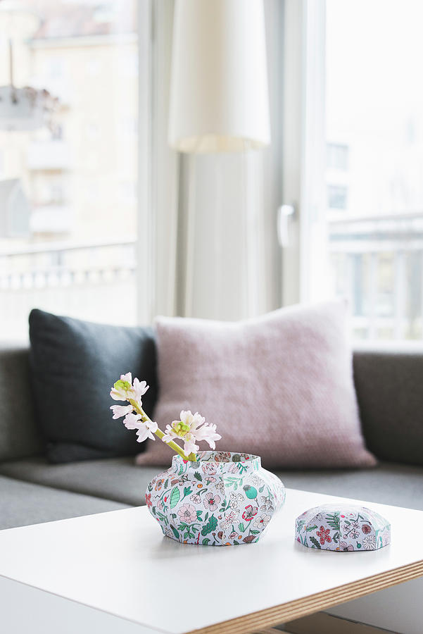 Hyacinths In Box Covered With Paper On Coffee Table Photograph by Alexandra Dost
