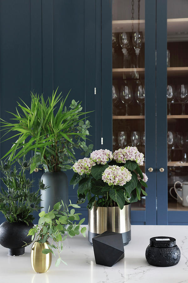 Hydrangea, Thistles And Twigs In Black And Golden Vases Photograph by Annette Nordstrom
