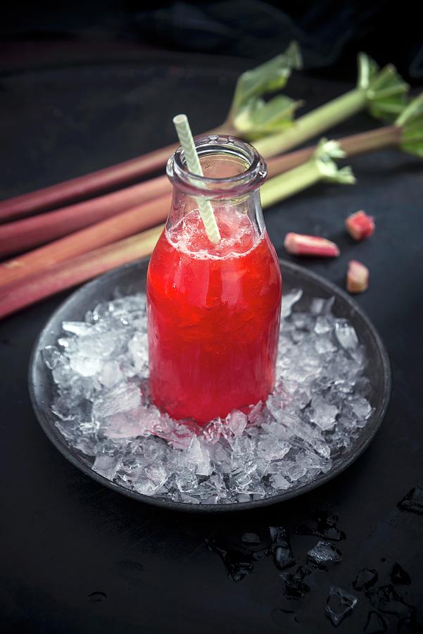 Ice Cold Rhubarb And Strawberry Juice Photograph by Kati Neudert