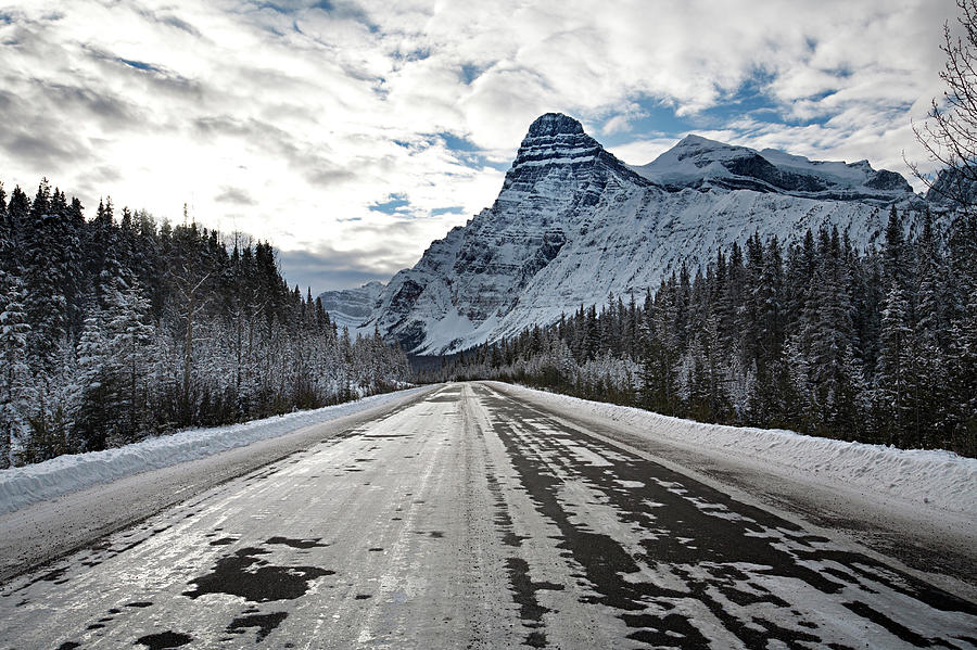 Ice Covered Highway Leads Towards Photograph by Aaron Black