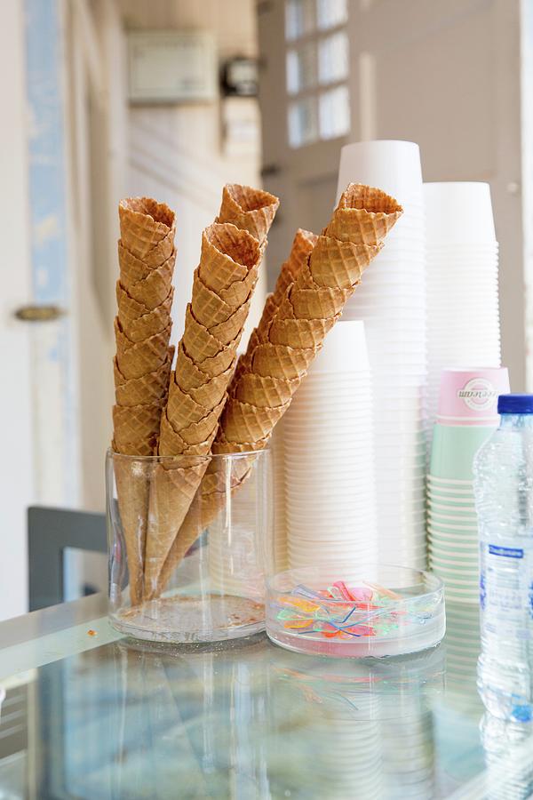 Ice Cream Cones And Tubs In An Ice Cream Parlour Photograph by Claudia Timmann