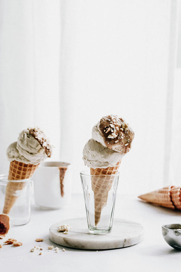 Ice Cream In A Cone With Salted Caramel And Nuts Photograph by Kasia Wala