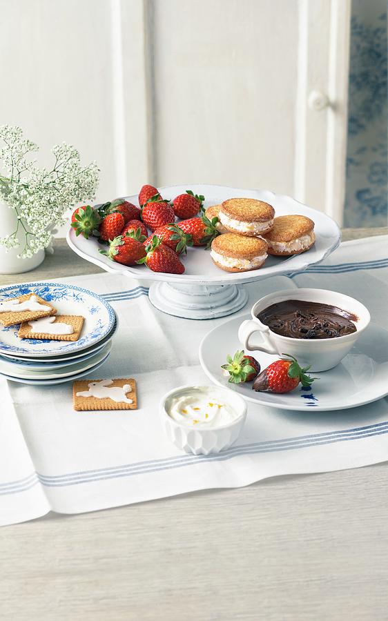 Ice Cream Sandwiches And Chocolate Fondue With Strawberries As An Easter Dessert Photograph by Jalag / Wolfgang Schardt