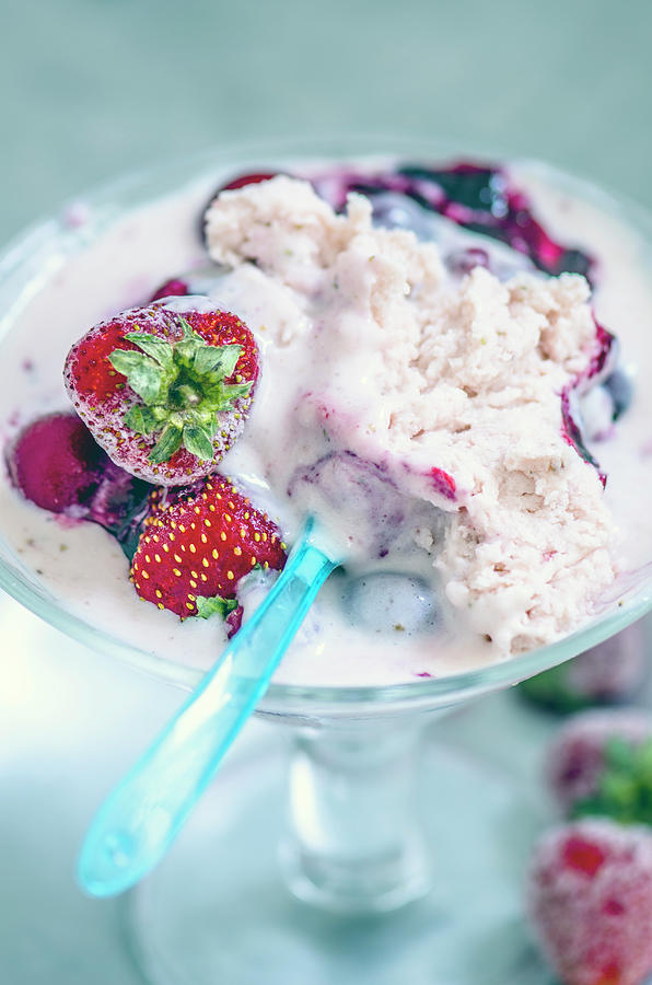 Ice Cream With Fresh Berries In A Sundae Glass Photograph by Gorobina