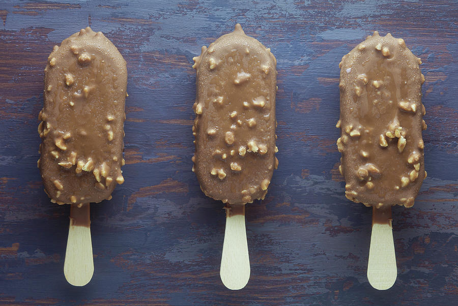 Ice Lollies With A Chocolate And Nut Glaze Photograph by Barbara Pheby