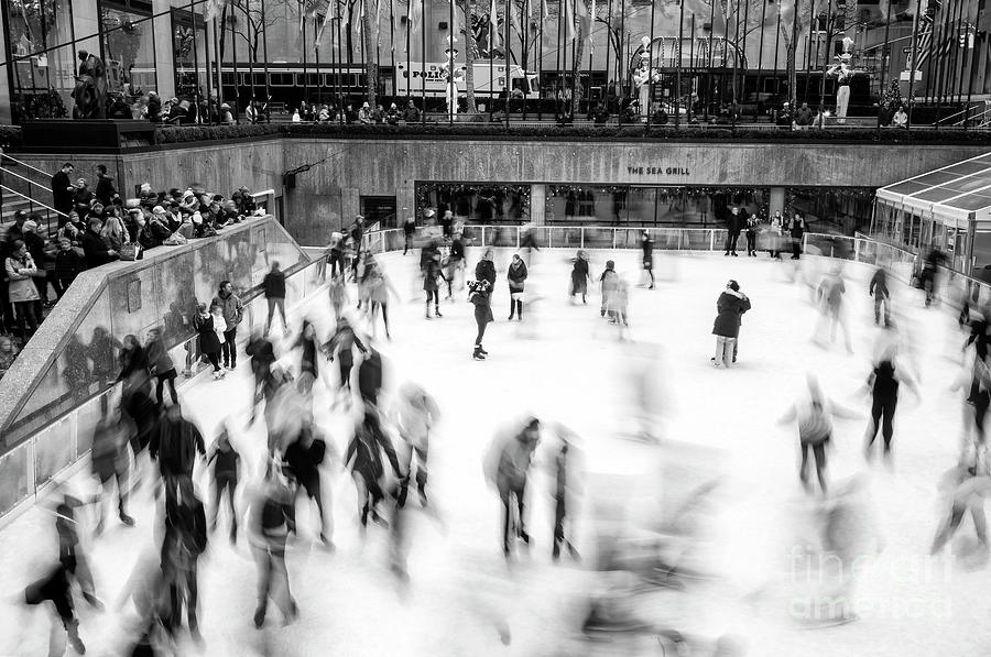 Ice Skaters on the Rink New York City Photograph by John Rizzuto