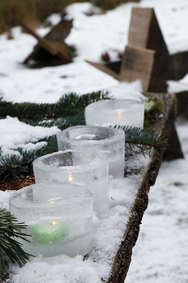 Ice Tealight Holders In Snow Photograph by Johanna Von Aesch