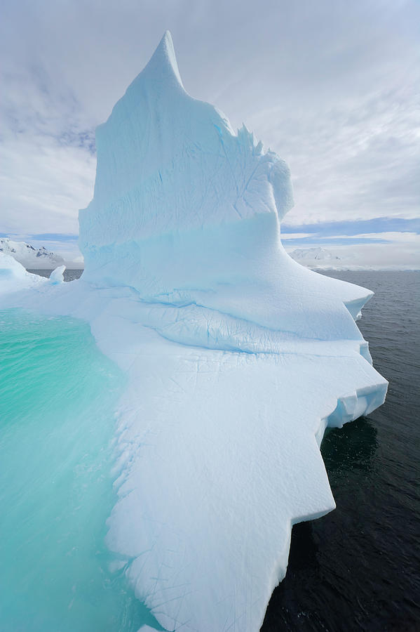 Iceberg And Clouds, Antarctic Peninsula Photograph by Eastcott Momatiuk