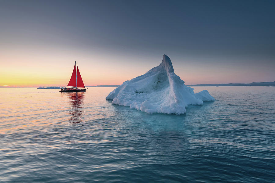 Icebergs and red sail in Greenland by Suranga Weeratunga Icebergs and red sail in Greenland by Suranga Weeratunga