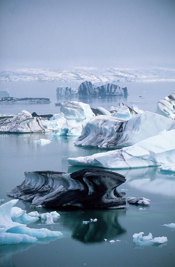 Icebergs Floating In Lake Photograph by Frans Lemmens