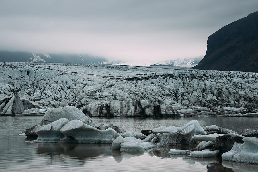 Nature Photograph - Icebergs In Fjallsarlon Glacial Lagoon by Ivan Kmit