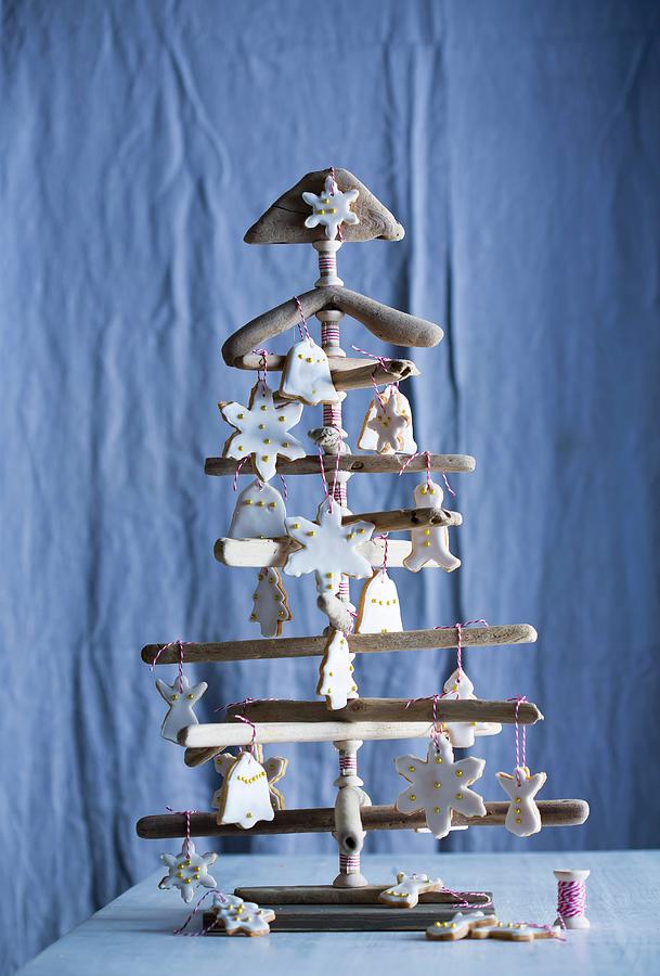 Iced Biscuits Decorating Wooden Christmas Tree Photograph by Great Stock!