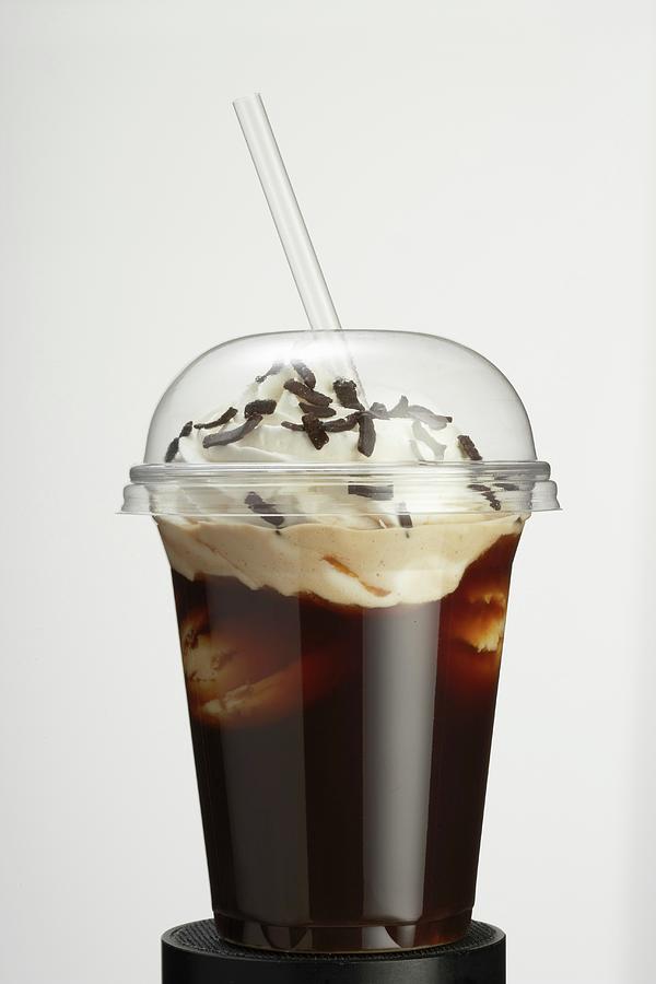 Iced Coffee With Cream And Grated Chocolate In A Takeaway Cup Photograph by Till Melchior