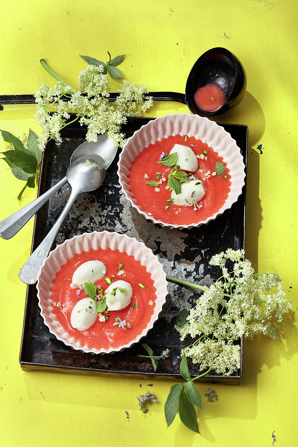 Iced Elderberry And Strawberry Soup With Tonka Yoghurt Dumplings Photograph by Ulrike Stockfood Studios / Holsten