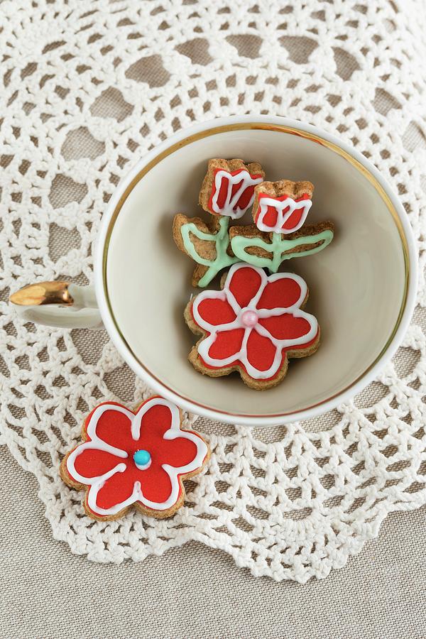 Iced, Flower-shaped Biscuits In A Cup seen Above Photograph by Mandy Reschke
