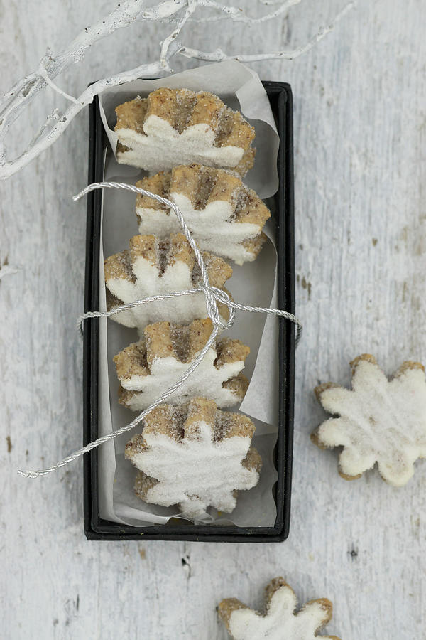 Iced Flower-shaped Cinnamon Biscuits In A Box Photograph by Martina Schindler