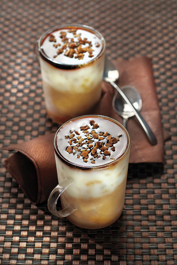 Iced Milk Coffee With Coffee Syrup And Walnuts Photograph by Perrin