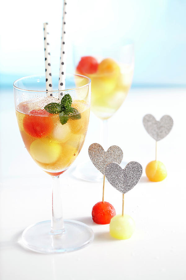 Iced Tea With Melon Balls, Maple Syrup And Mint Photograph by Teubner Foodfoto