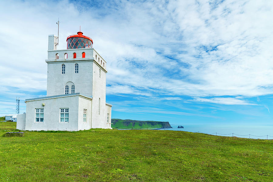 Iceland, South Iceland, Suwurland, Dyrholaey Lighthouse At Dyrholaey Viewpoint Digital Art by Sebastian Wasek