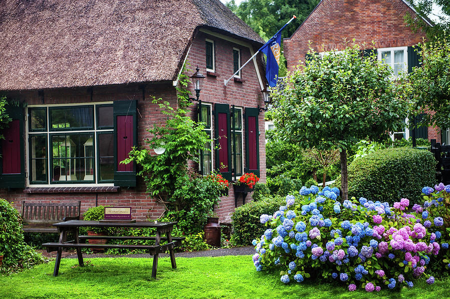 Idyllic Giethoorn Cottages. The Netherlands Photograph by Jenny Rainbow