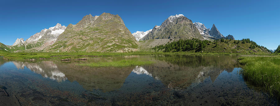 Idyllic Mountain Lake Reflecting Peaks Photograph by Fotovoyager