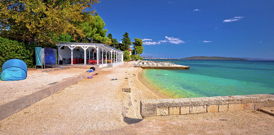 Idyllic turquoise beach and bar near Split panoramic view Photograph by Brch Photography
