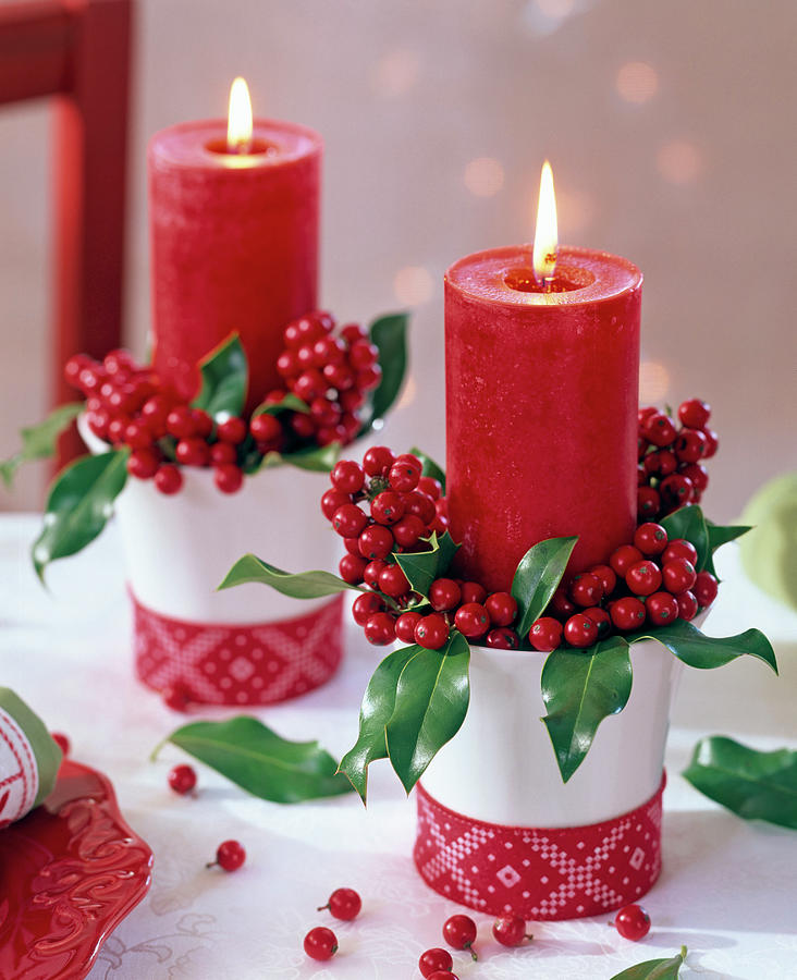 Ilex With Red Candles In White Cups Decorated With Ribbon Photograph by Friedrich Strauss