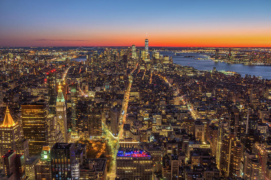 Illuminated Cityscape of Manhattan, New York in the evening twil ...