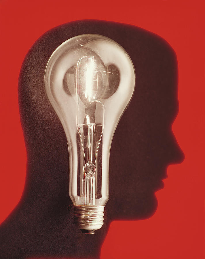 Illuminated Lightbulb And Mannequin Head Photograph by H. Armstrong Roberts