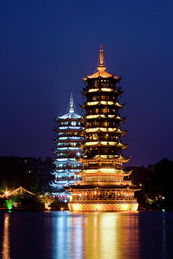 Illuminated Pagodas In Guilin, China Photograph by Pola Damonte Via Getty Images